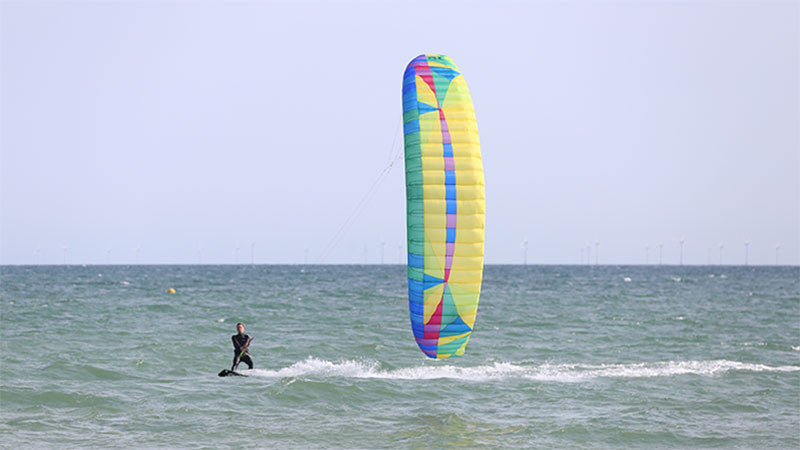 Airwave Koala Foil Kite Sunrise with twin tip kiteboard