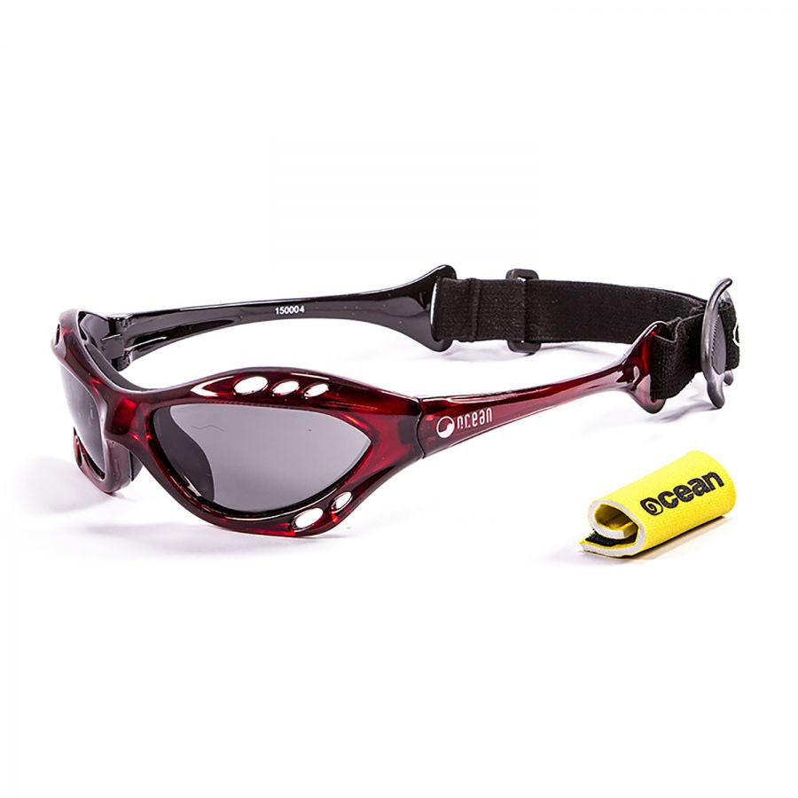 Ocean Sunglasses Cumbuco Translucent Red frames w/polorized Smoke Lens